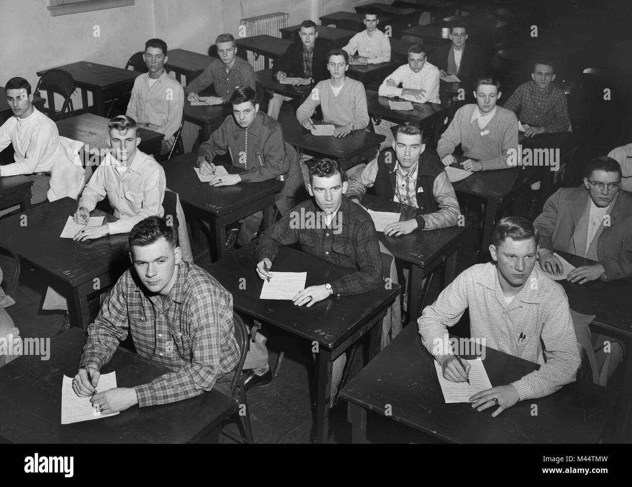 Test taking for high school boys, ca. 1952. Stock Photo