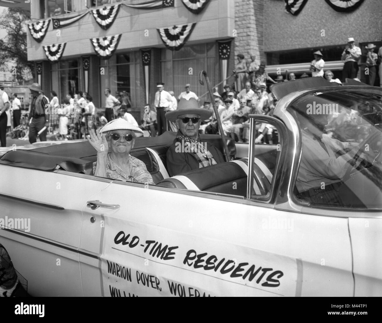 Senior citizens have a place of honor in a community parade by virtue of their age, ca. 1959. Stock Photo