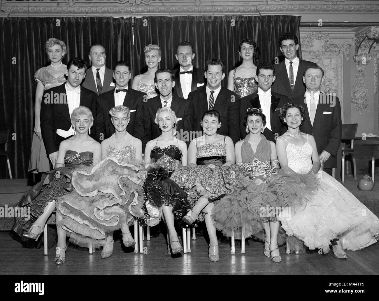 Group portrait of formally dressed partygoers in Chicago, ca. 1958. Stock Photo