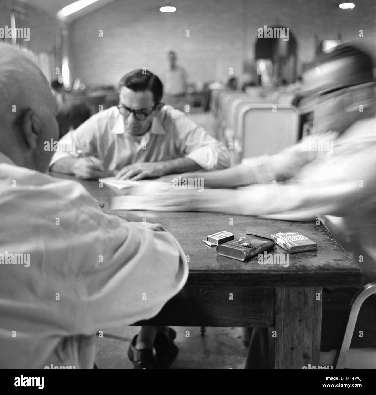 Men Play Cards At A Community Center Ca 1960 Stock Photo Alamy