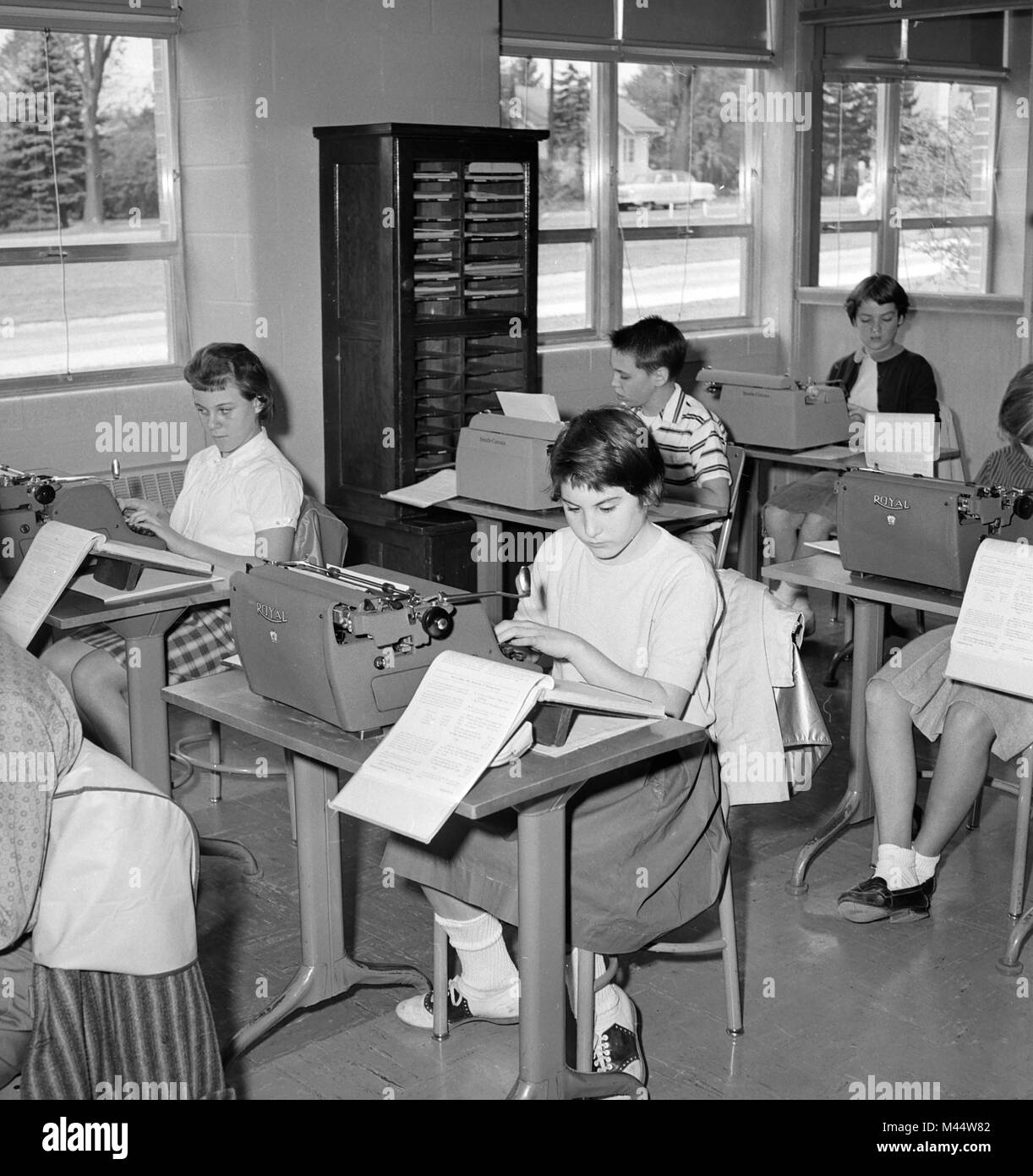 Seventh graders work on typing skills, ca. 1964. Stock Photo