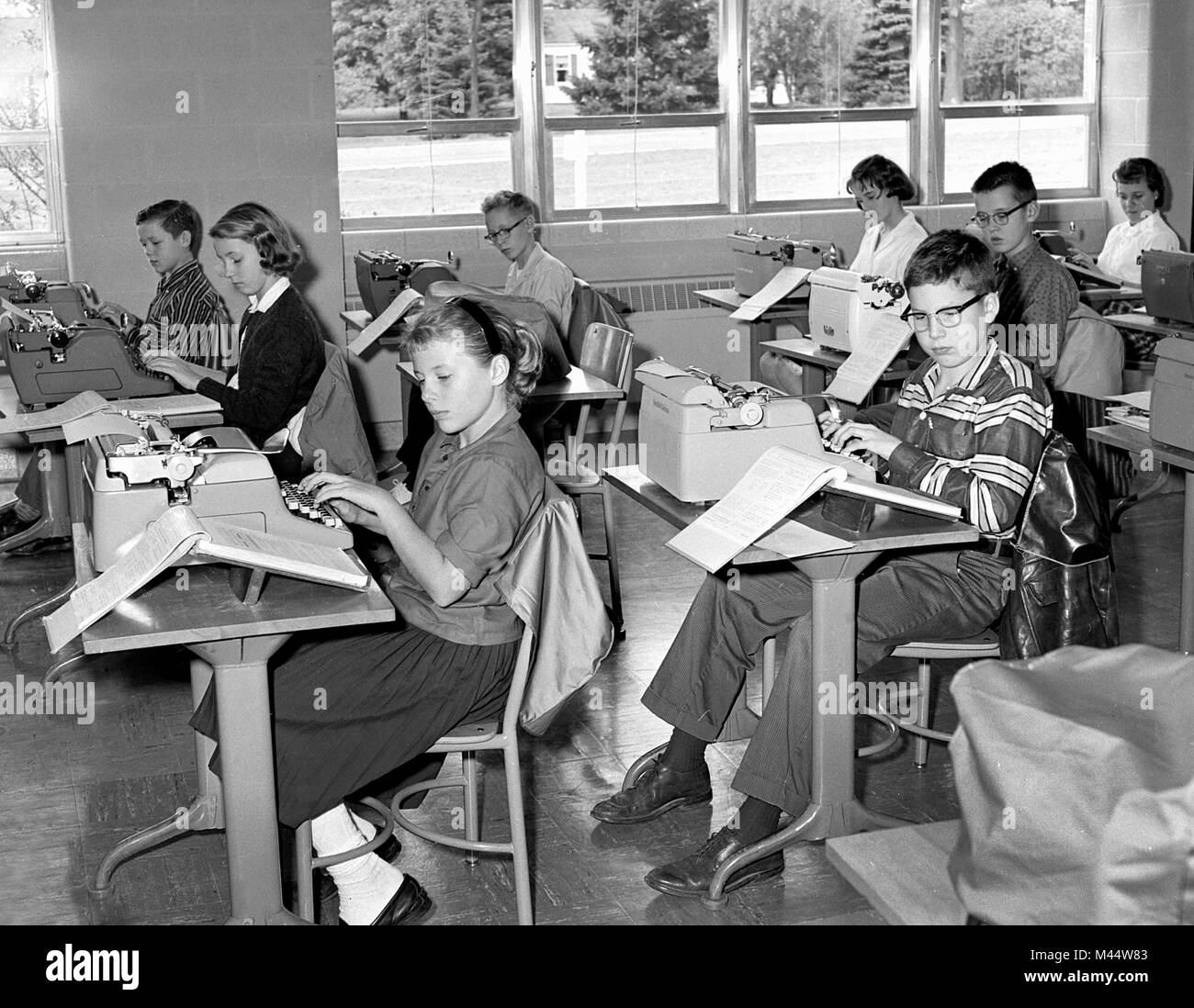 Seventh graders work on typing skills, ca. 1964. Stock Photo