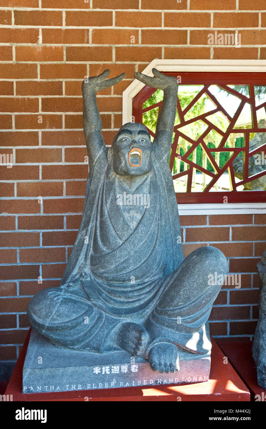 Raised Hand Lohan sculpture at the International Buddhist Temple in Richmond, BC, Canada. Stock Photo