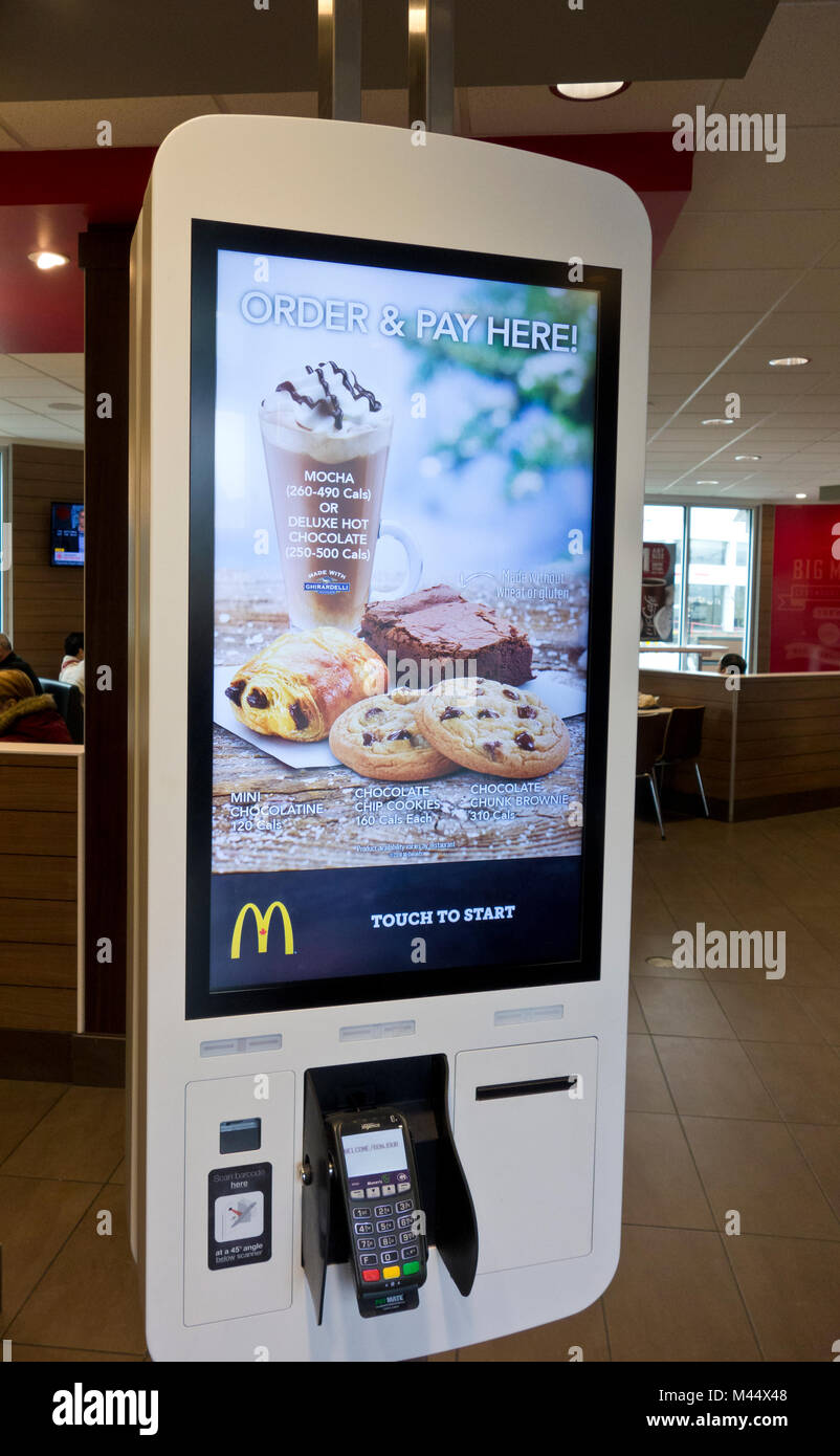 Self-serve order kiosk at McDonald's restaurant in Metro Vancouver, BC,Canada.  Self-serve kiosks at a Canadian McDonald's restaurant, 2018. Stock Photo