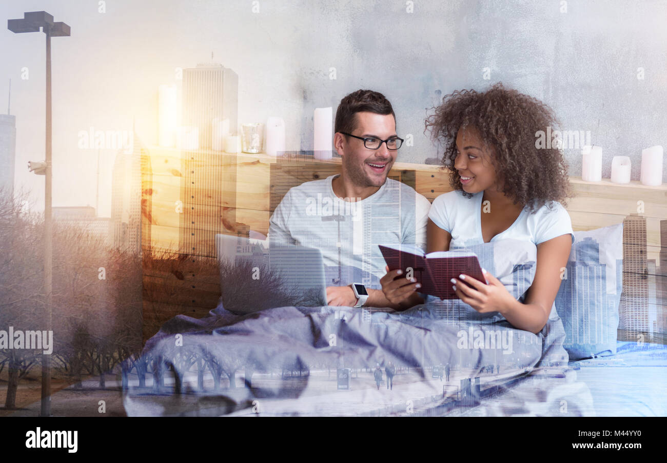 Pleasant nice woman reading a story Stock Photo - Alamy
