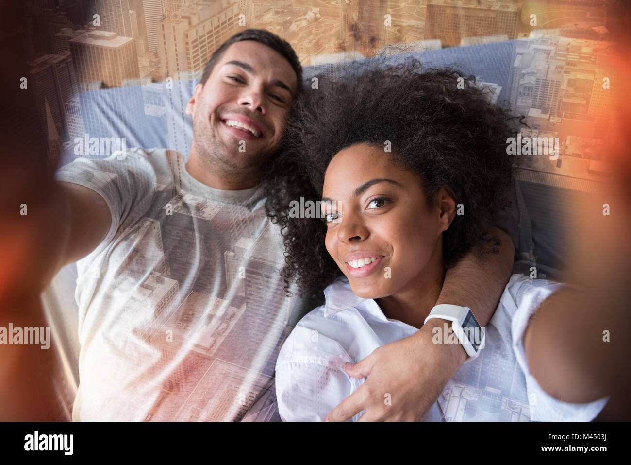 Joyful happy couple taking a selfie Stock Photo