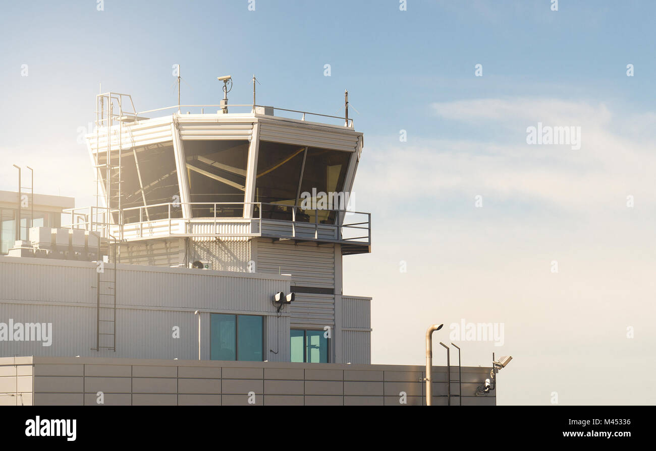 Air traffic control tower in a small airport. Old vintage and retro filter look. Stock Photo