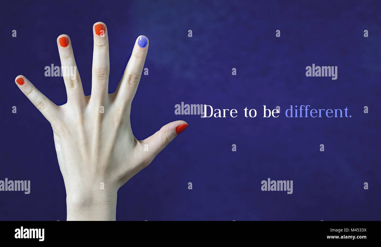 Dare to be different. Originality and creativity concept with blue background. One different nail color in finger in caucasian hand. Red and blue pain Stock Photo