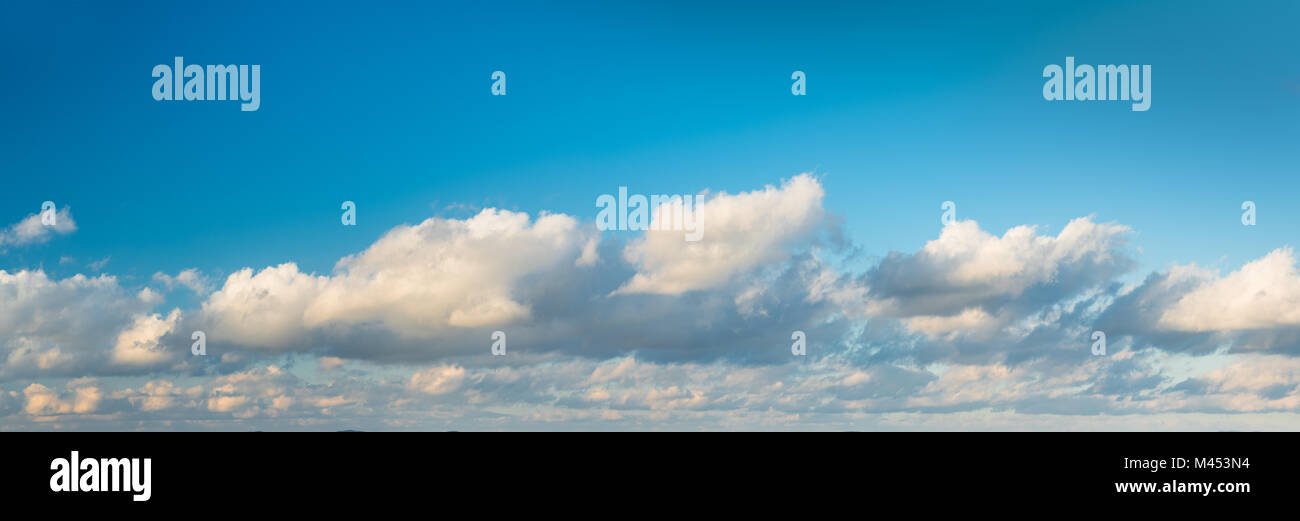 Panorama of beautiful cloudy sky. Nature background. Stock Photo