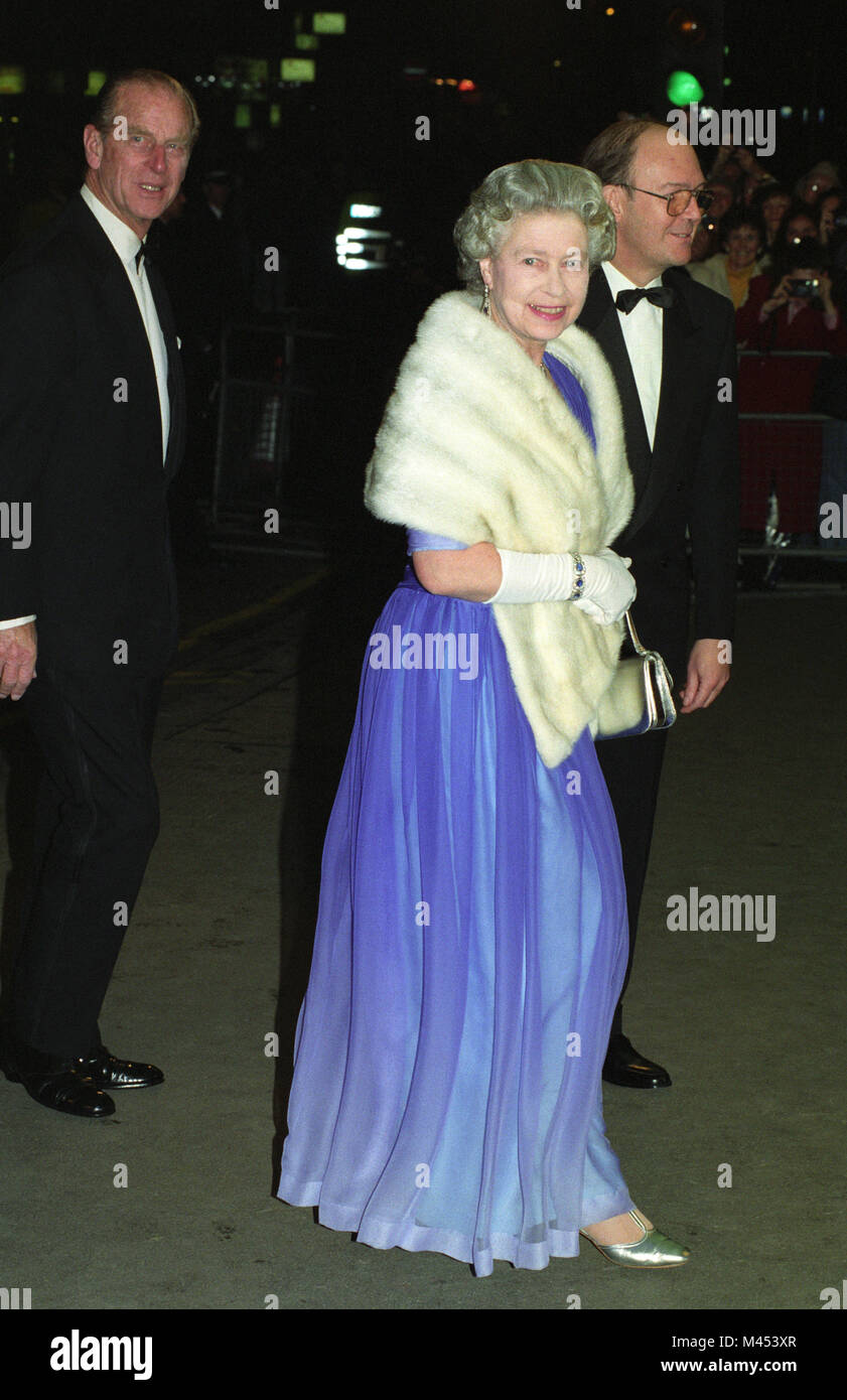 Queen Elizabeth II and Prince Philip, Duke of Edinburgh, arrive at the Victoria Palace Theatre in London to attend the Royal Variety Performance. Stock Photo