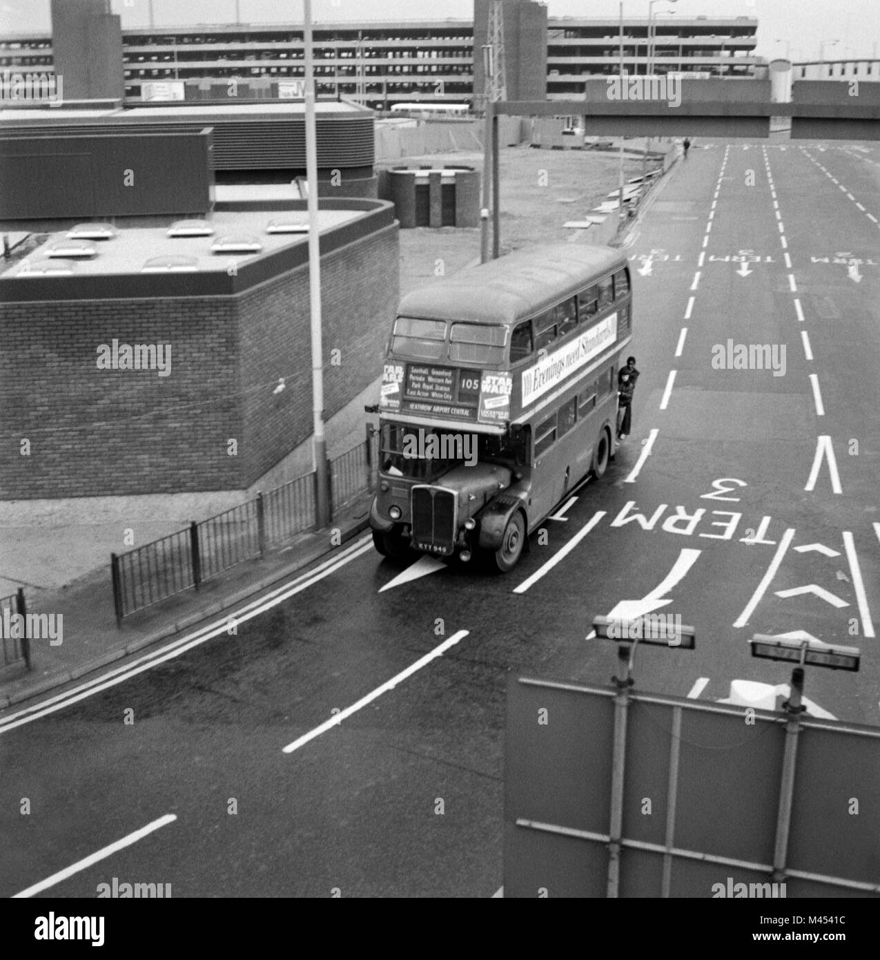 London bus heading towards Terminal 3 at Heathrow in 1977. Stock Photo