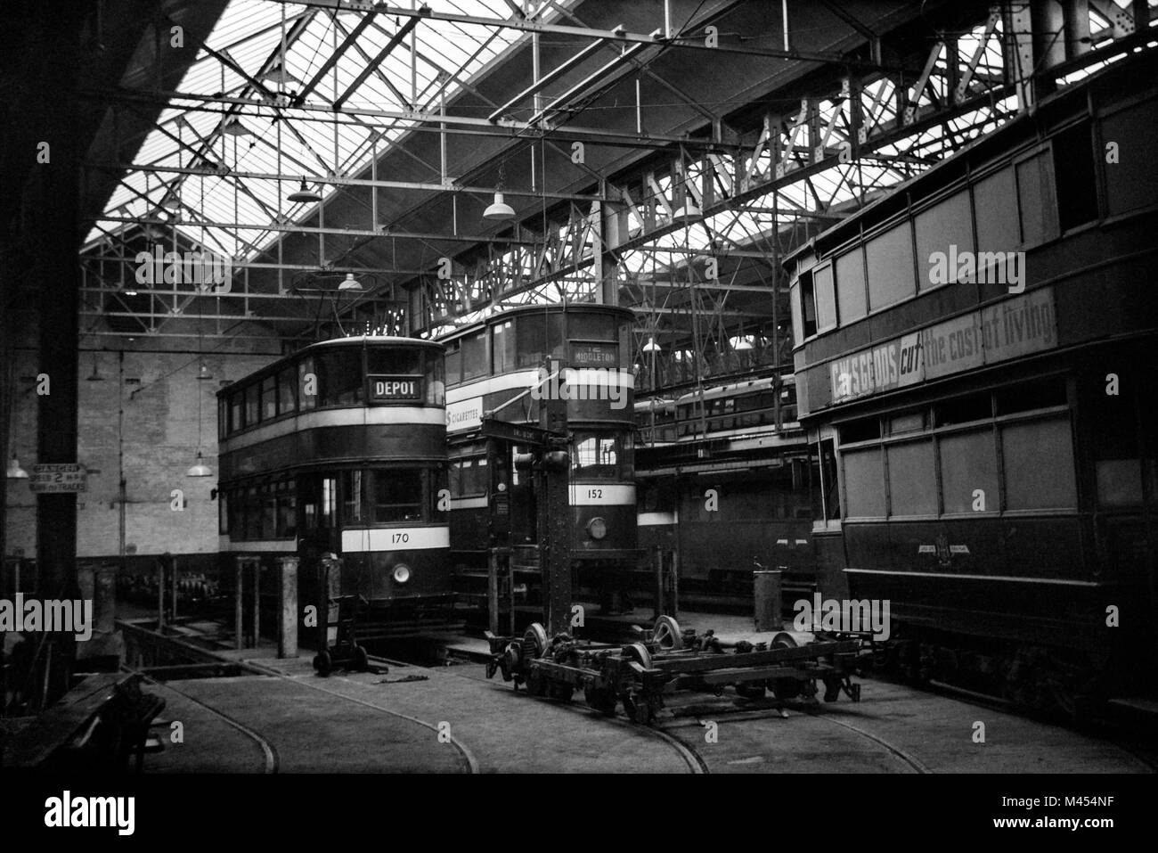 Leeds Corporation Trams 170 and 152 being repaired at possibly Swinegate Tram Shed, Leeds. Image taken in the 1950s Stock Photo