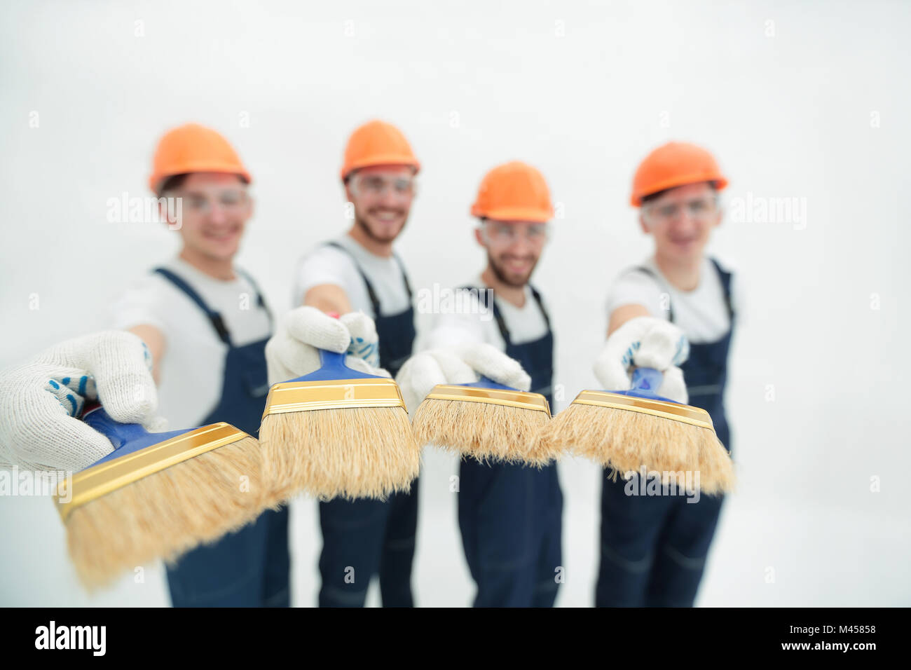 group of builders with different tools Stock Photo - Alamy