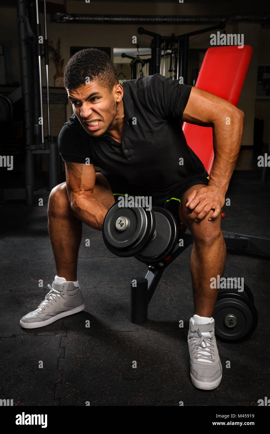 Sitting biceps curl hi-res stock photography and images - Alamy