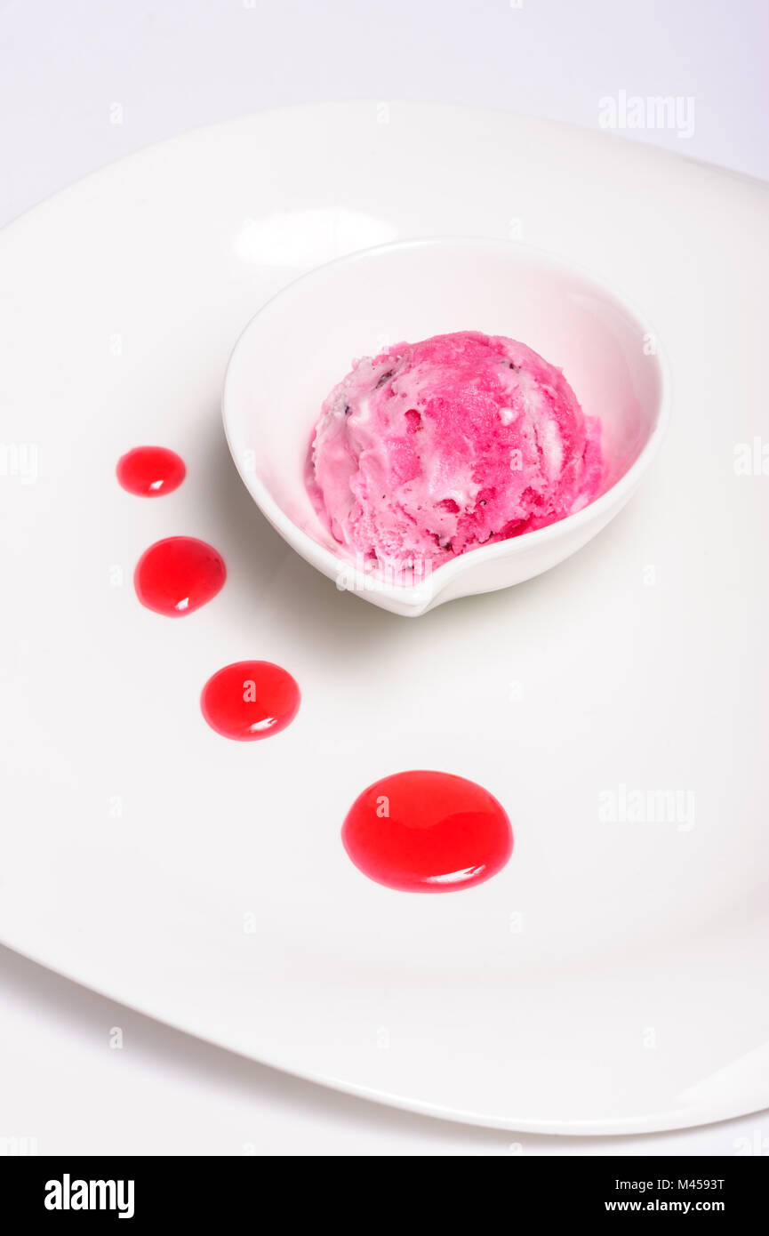 Raspberry cheese cake and ice cream ball Stock Photo