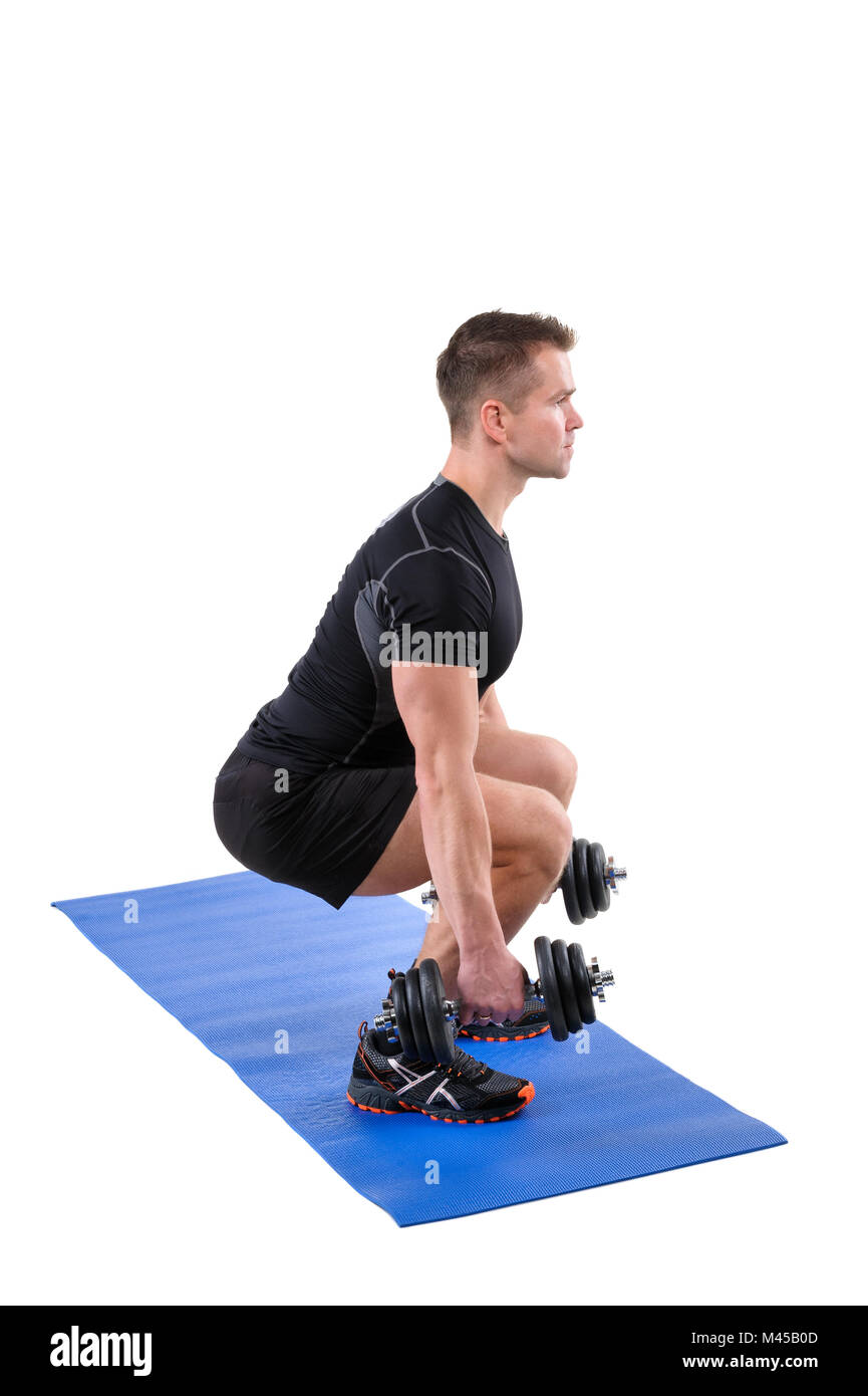 Standing Dumbbell Calf Raise or Squats workout Stock Photo