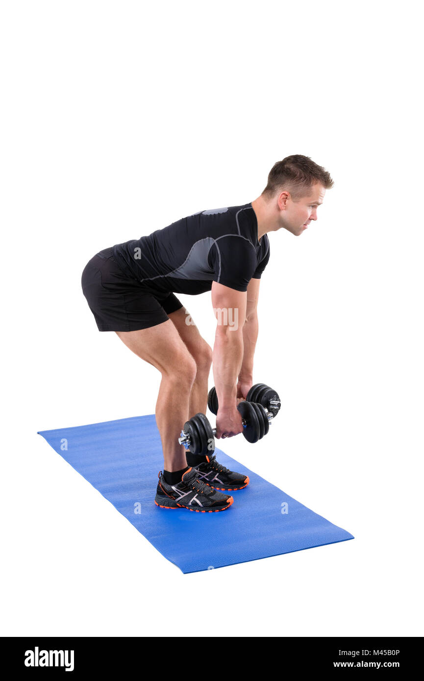 Standing Bent Over Dumbbells Row workout Stock Photo