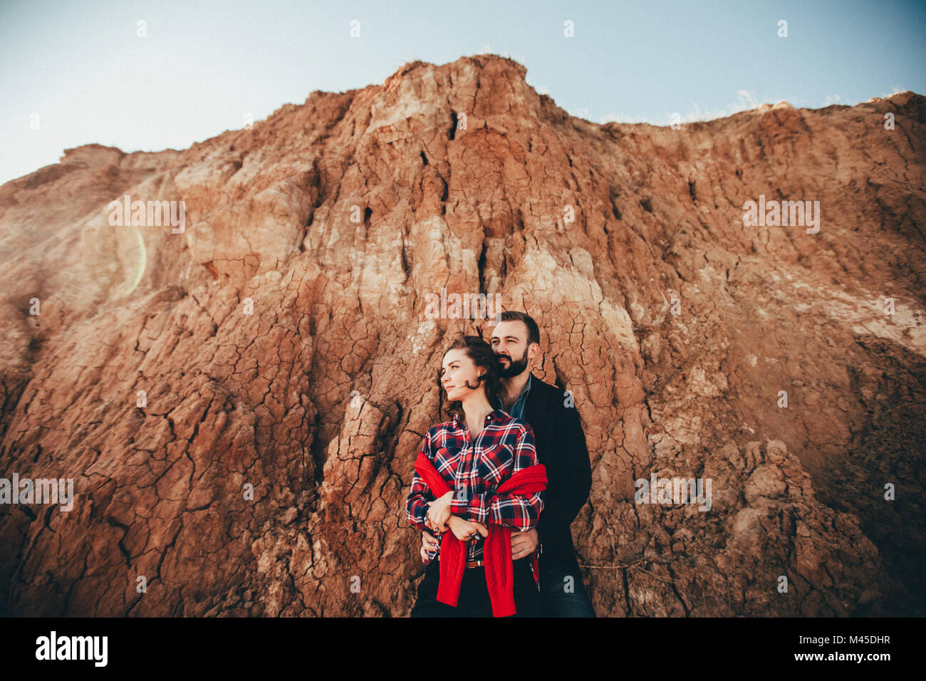 Romantic mid adult couple by beach cliff, Odessa Oblast, Ukraine Stock Photo