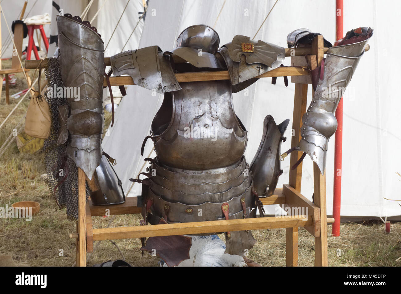 medieval body armour on a wooden stand Stock Photo