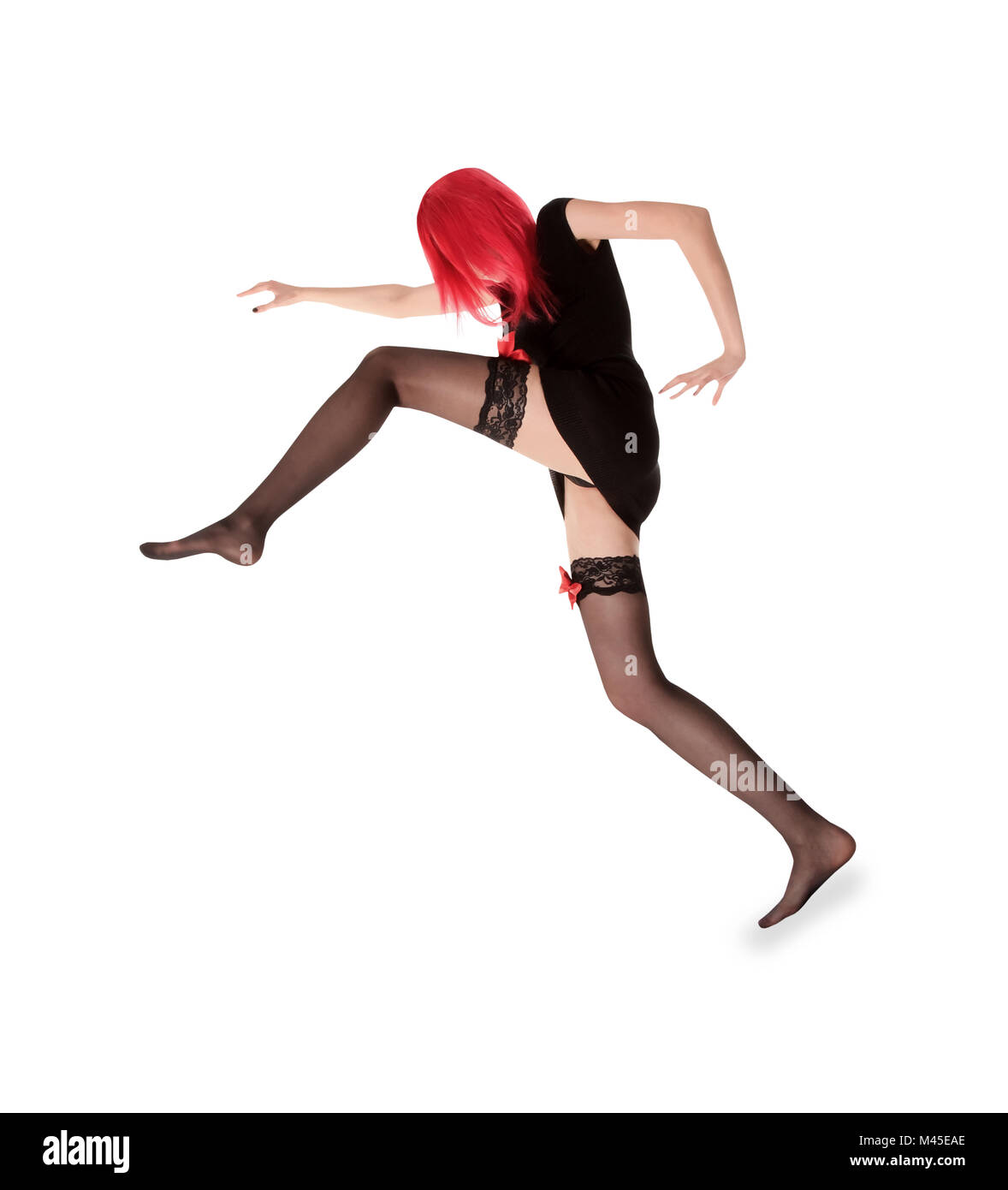 picture of red hair woman in black stockings posing Stock Photo