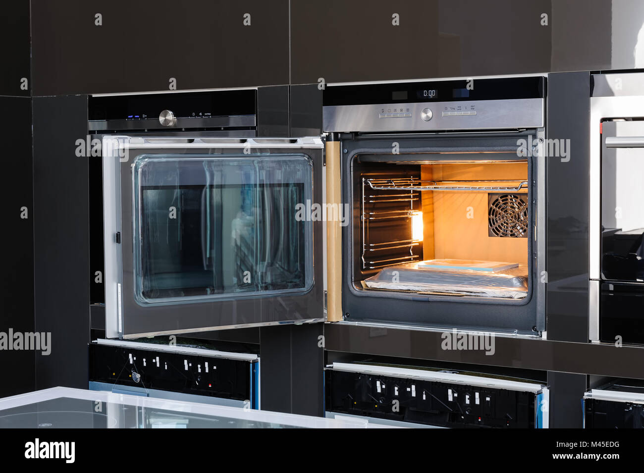 Modern oven with door open Stock Photo Alamy