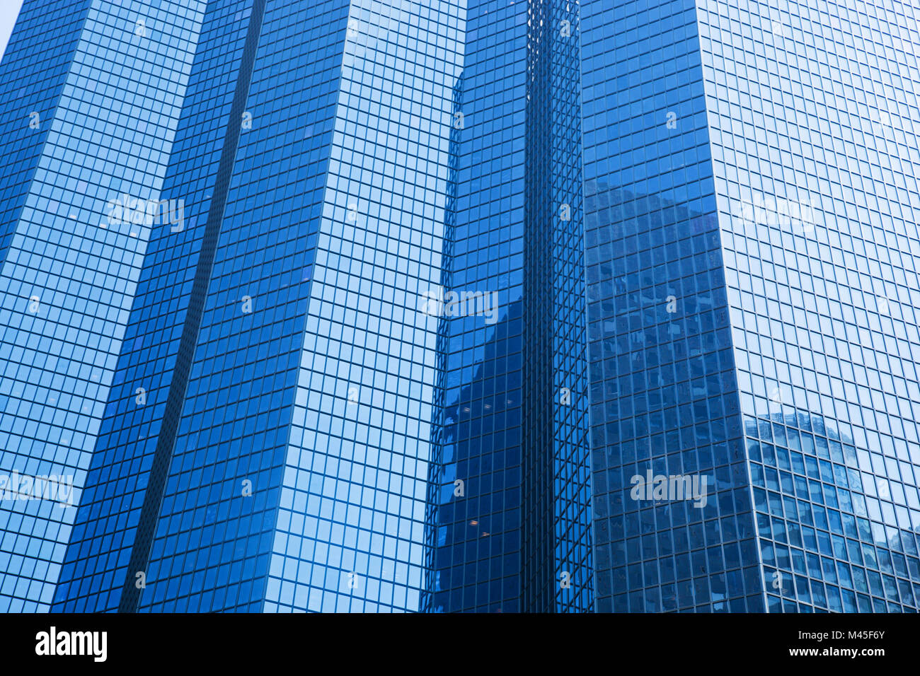 Business skyscrapers modern architecture in blue tint. Stock Photo