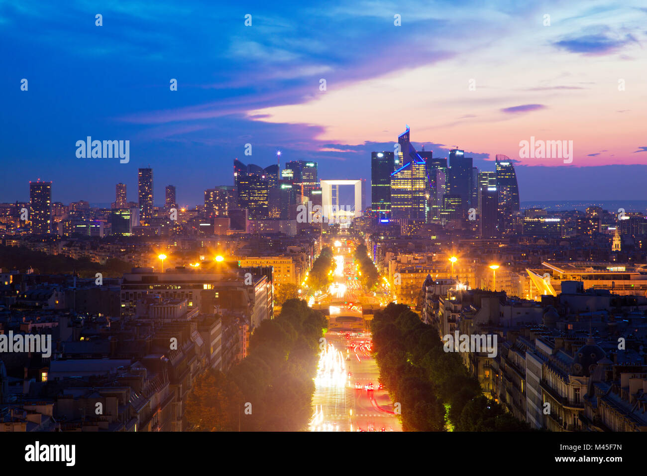 La Defense and Champs-Elysees at sunset in Paris, France. Stock Photo