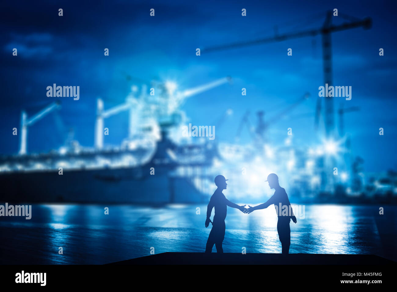Business handshake in shipyard, shipbuilding company Stock Photo