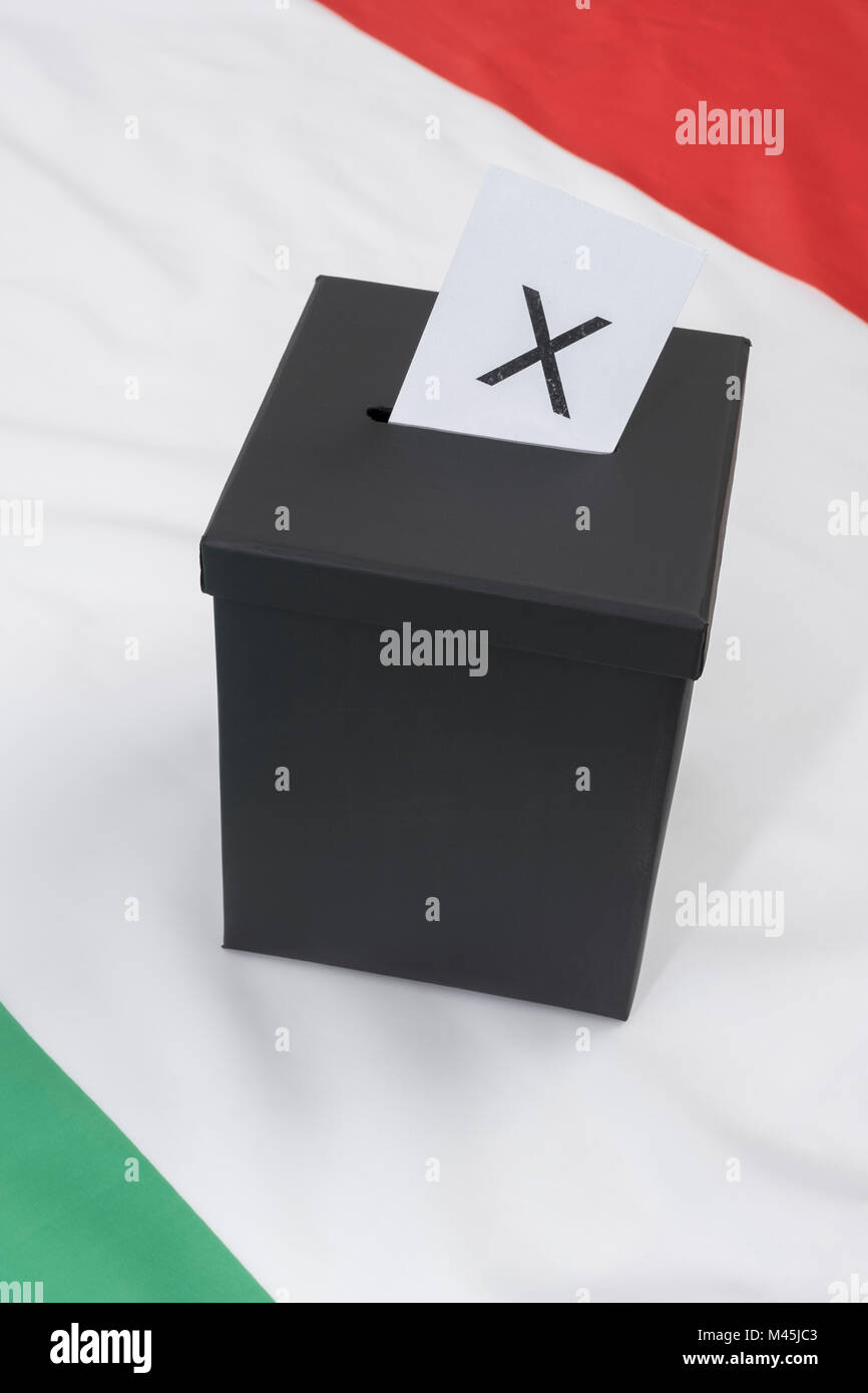 Black ballot box on Italian flag as metaphor for Italian general