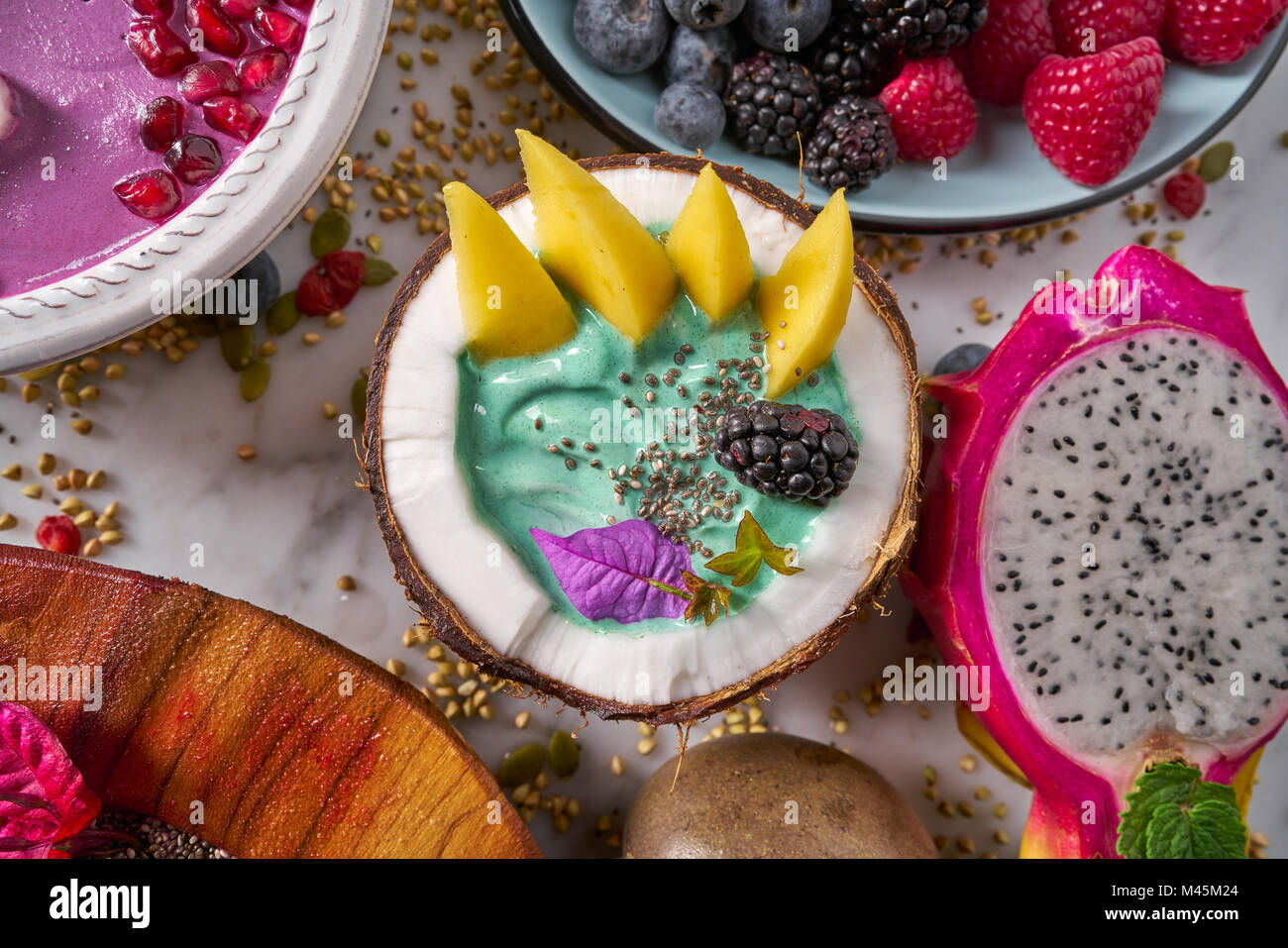 Spirulina algae bowl smoothie with mango Pitahaya dragon fruit Stock ...