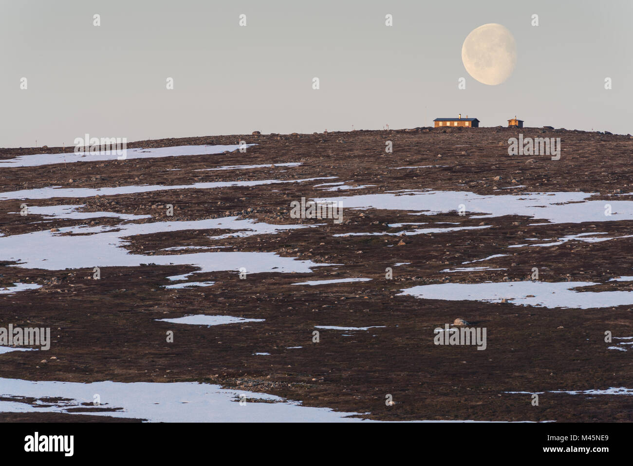 cabins in midnight sun, Dundret, Lapland, Sweden Stock Photo