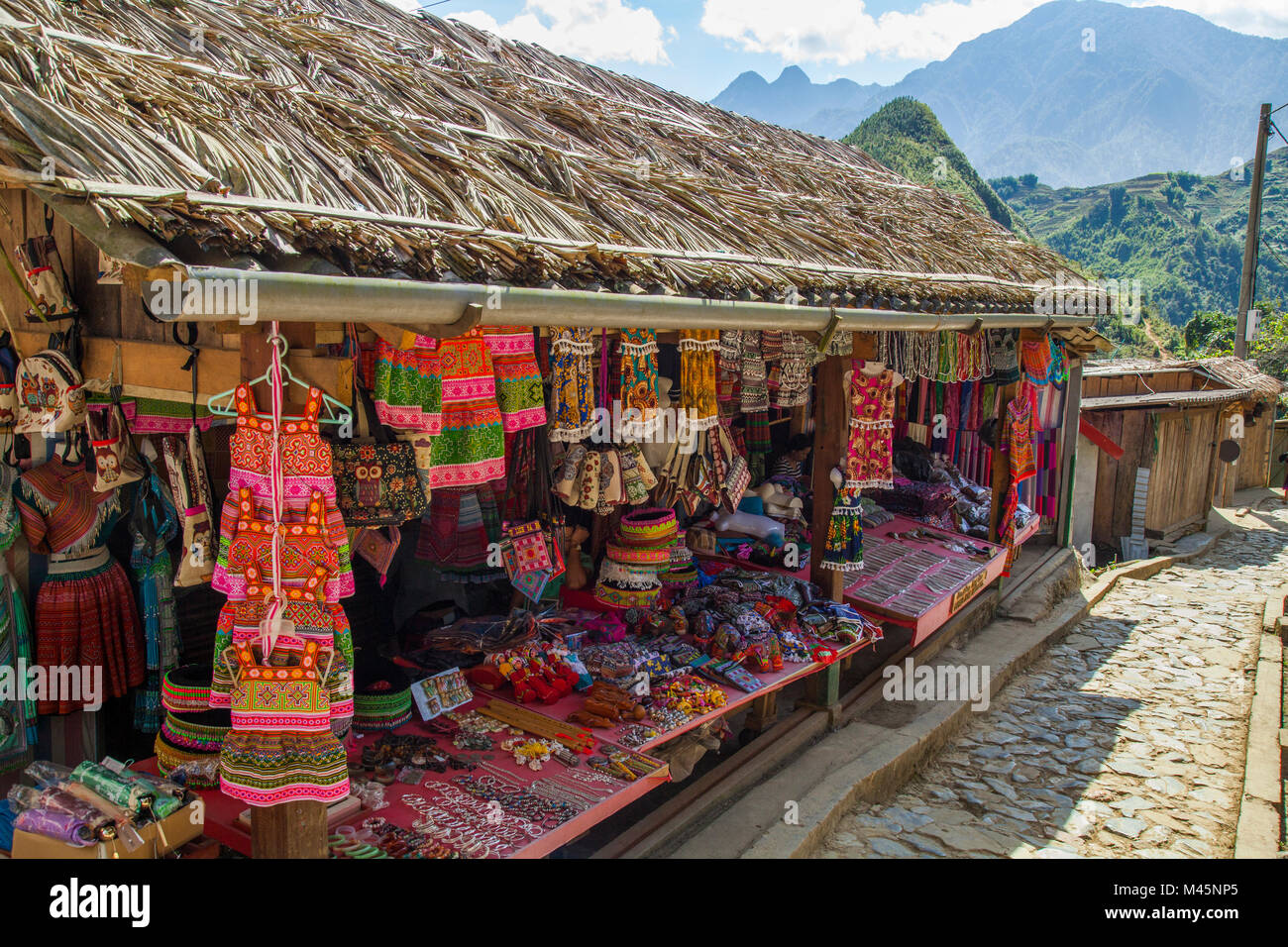 Shops and stores with souvenirs at local Cat Cat Village in the valley of Sapa Vietnam Stock Photo