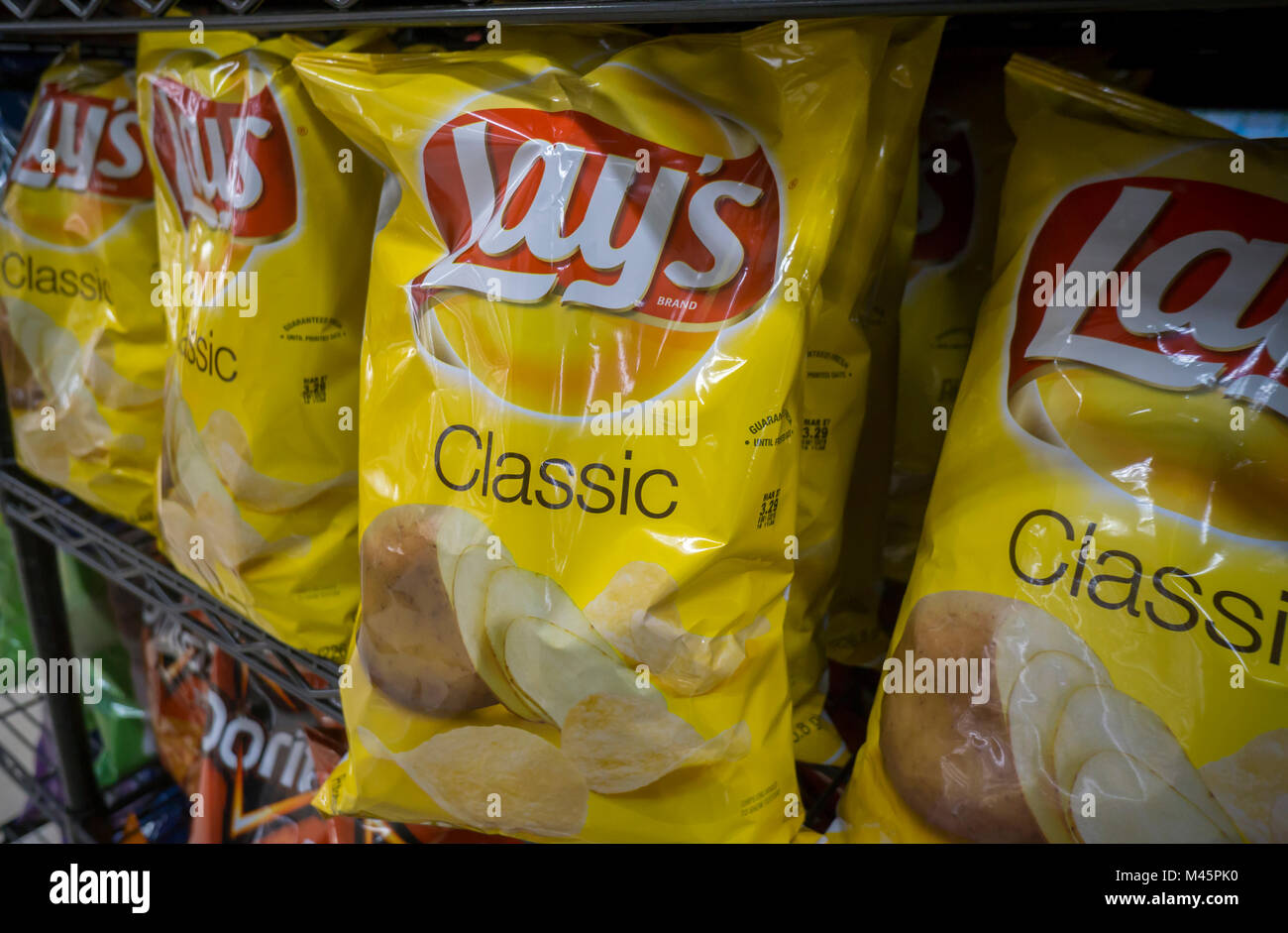 A display of PepsiCo Frito-Lay potato chip snacks in a supermarket in New York on Monday, February 12, 2018. PepsiCo is expected to release its fourth-quarter earnings prior to the opening bell on February 13. (Â© Richard B. Levine) Stock Photo