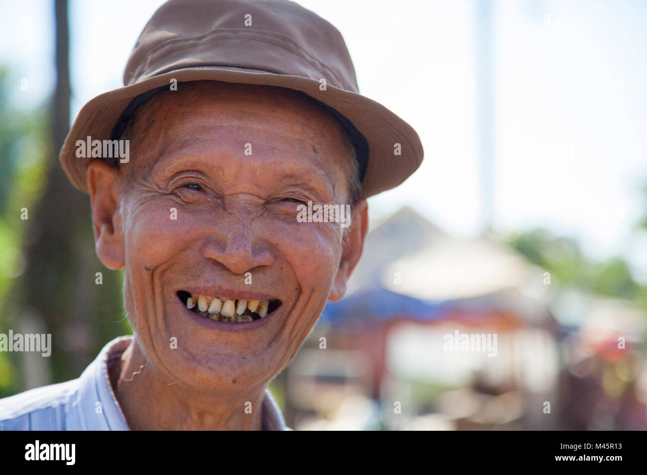 Local burmese man smiling at local market in Myanmar Stock Photo Alamy
