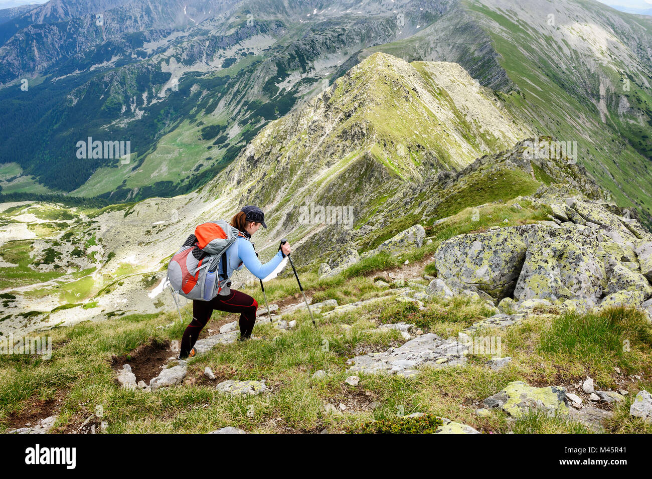 Hiking in the mountains hi-res stock photography and images - Alamy