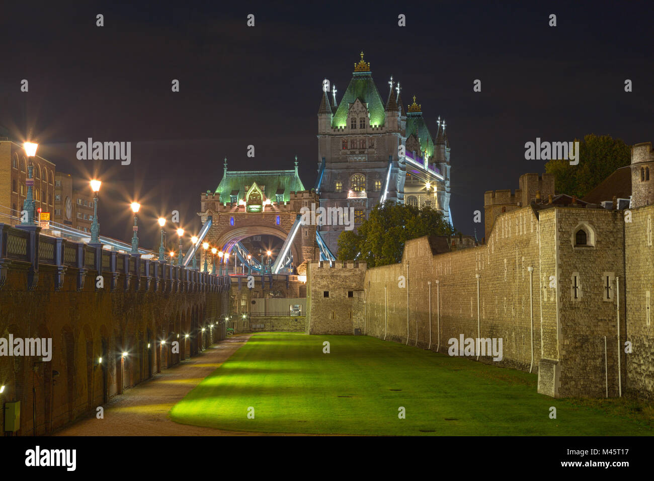 London - The Tower bridge and the moat of Tower at night. Stock Photo