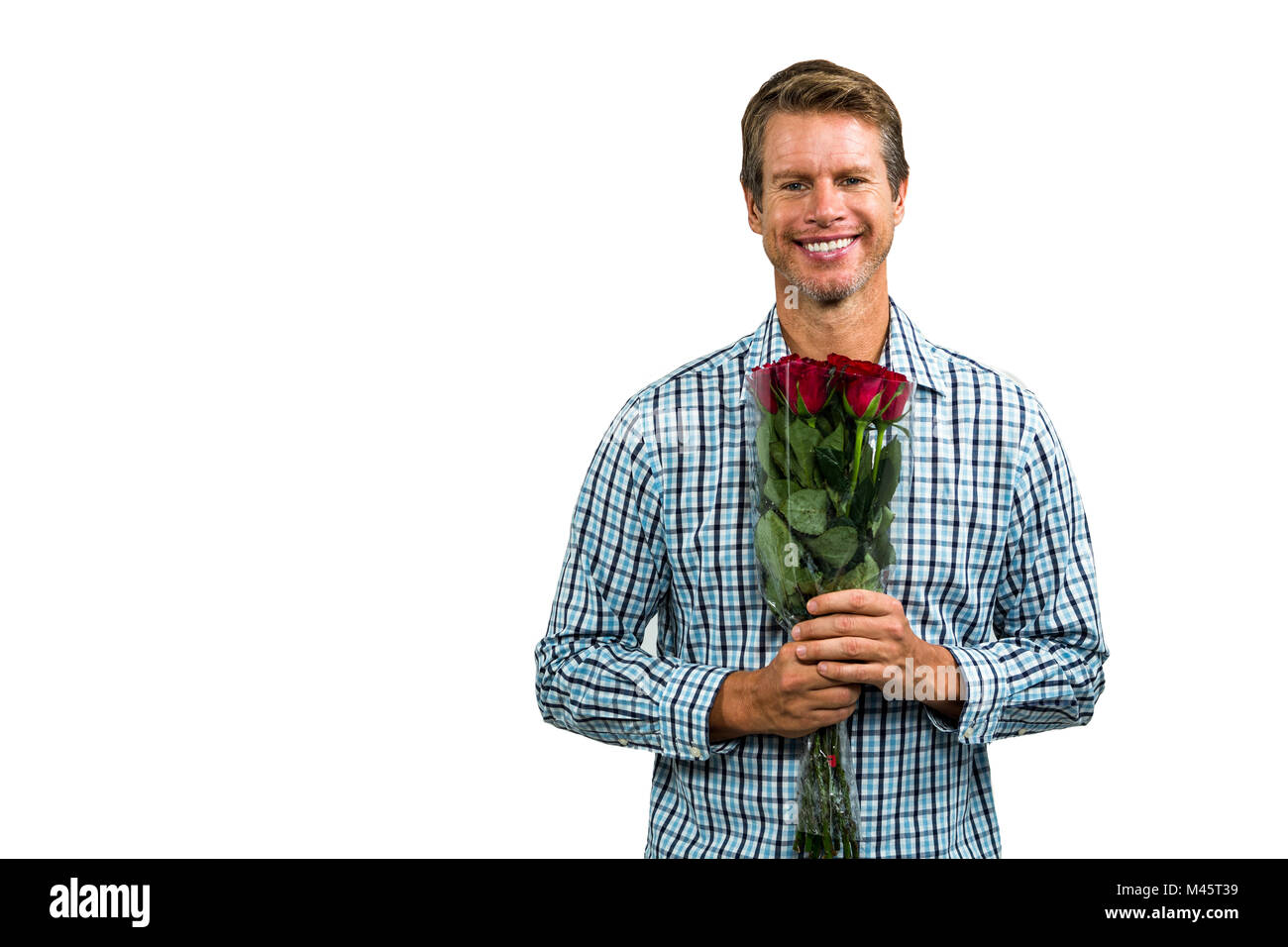 Handyman With Roses Portrait of smiling man holding bouquet of roses Stock Photo - Alamy
