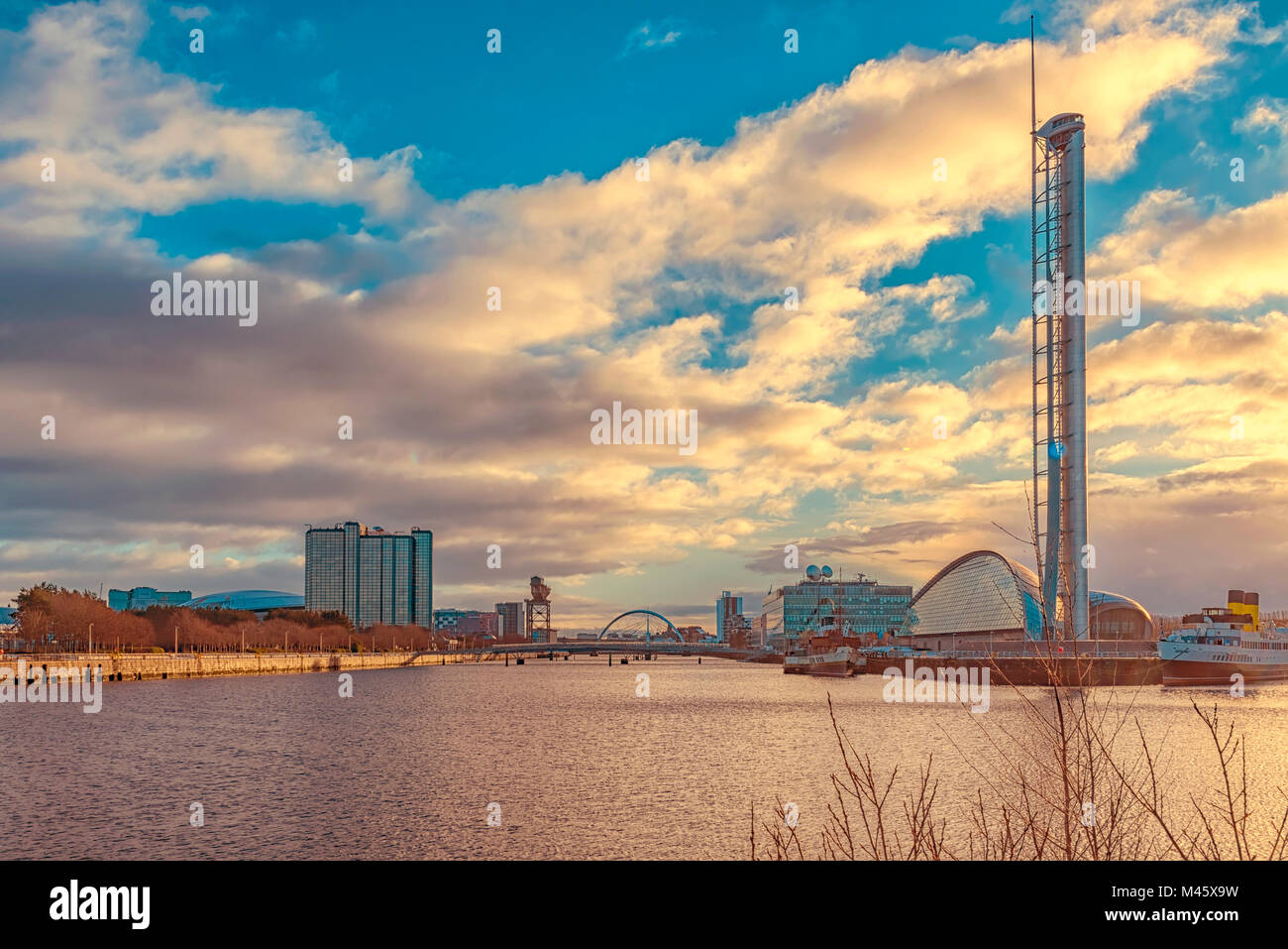 GLASGOW, SCOTLAND - JANUARY 17, 2018: A cityscape view of Glasgow from along the river clyde. Stock Photo