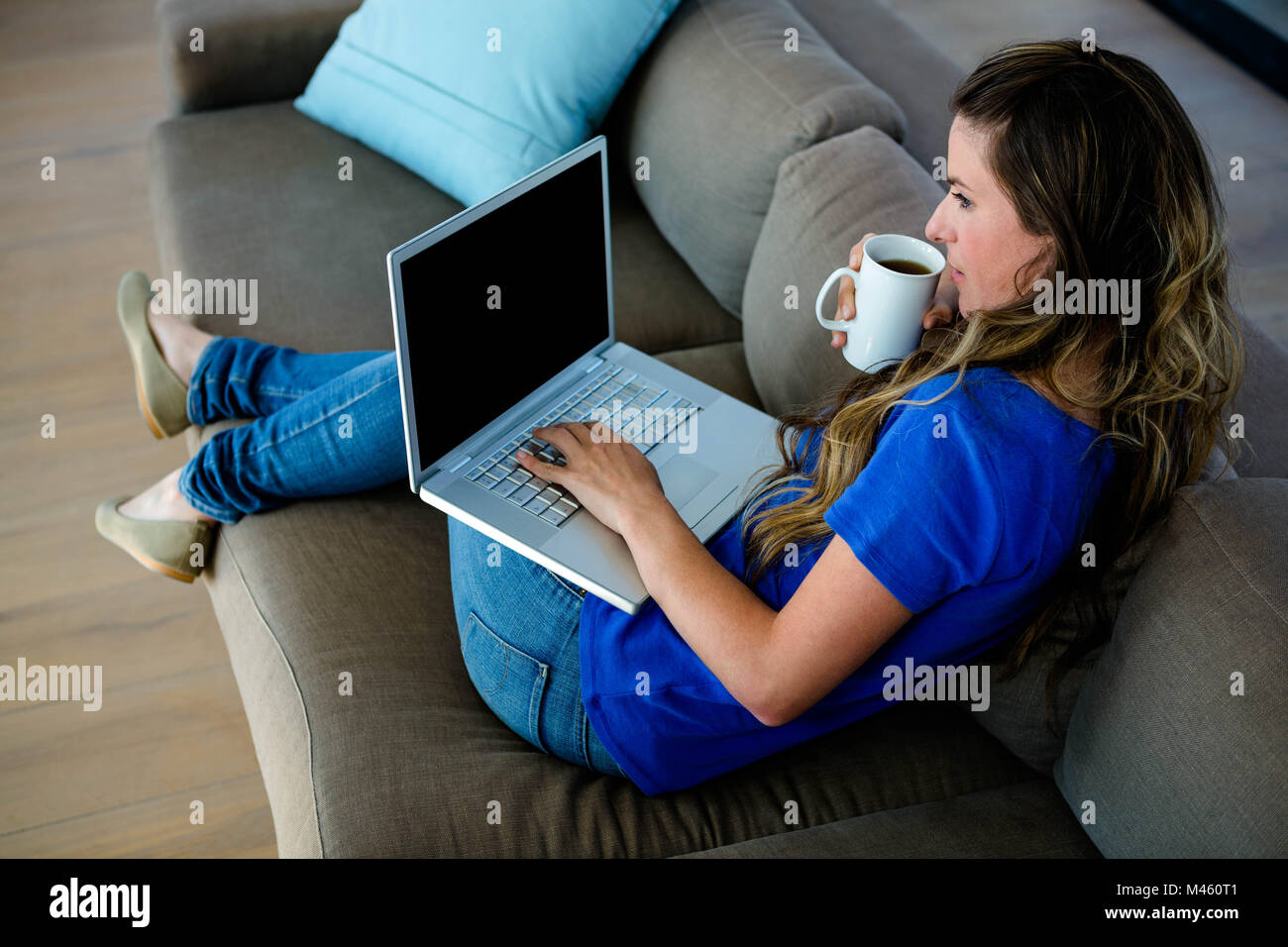 Focused black woman typing hi-res stock photography and images - Alamy