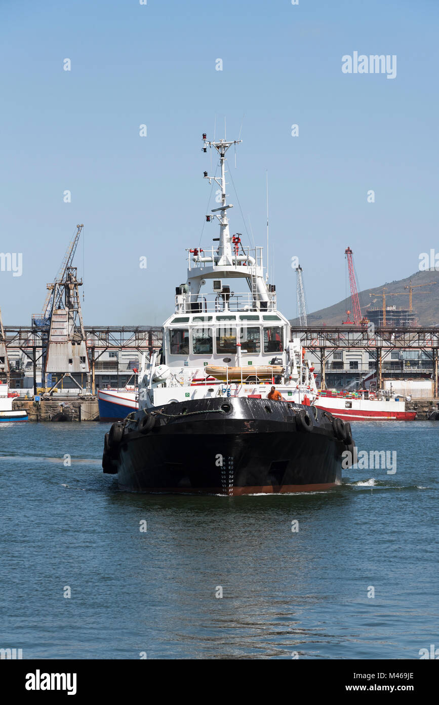 Ocean going tug underway on Cape Town harbour South Africa, Stock Photo