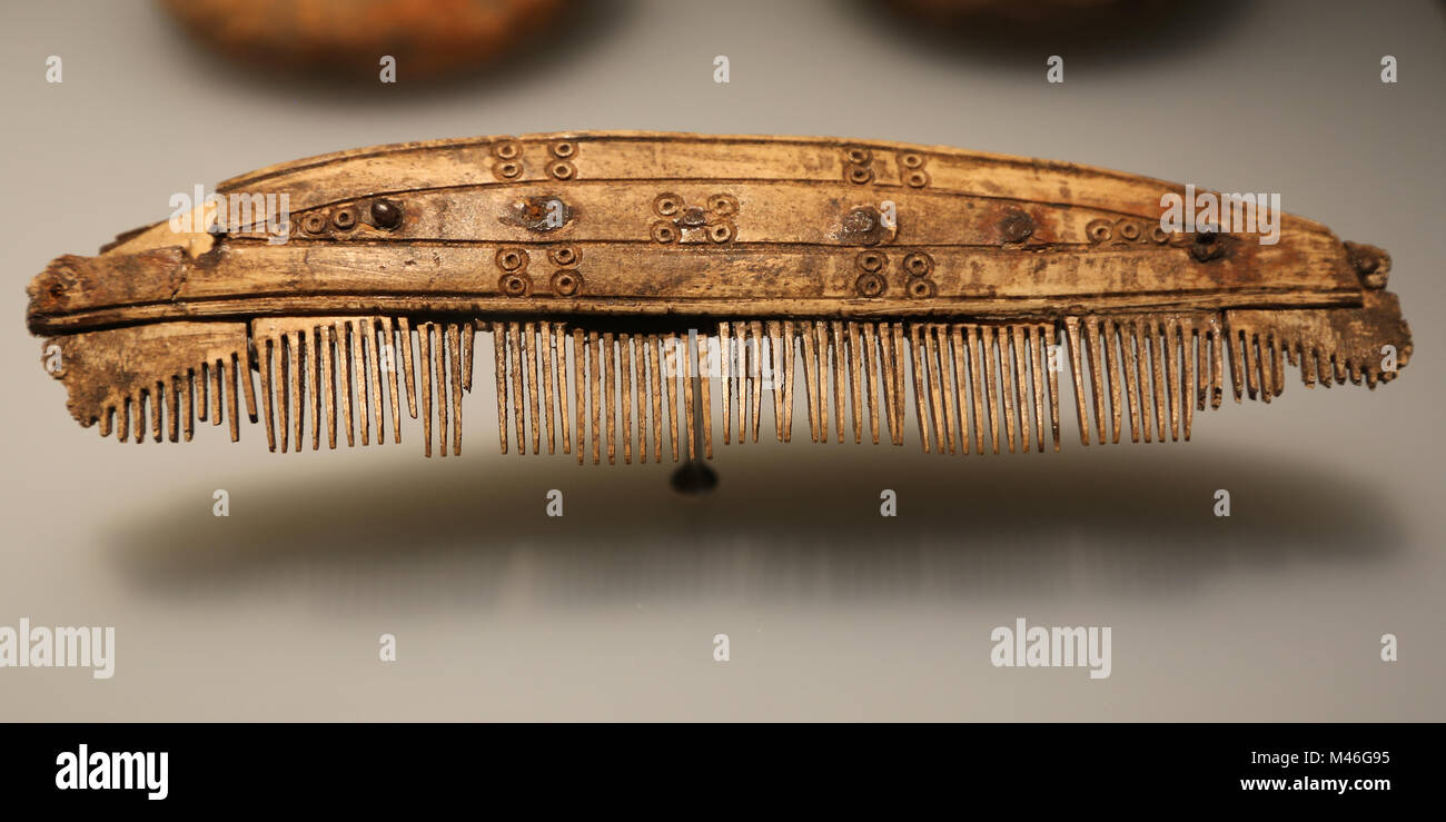 Viking objects. Comb made in bone, decorated with metal inlays. 10th century. Fohr, Denmark. Stock Photo