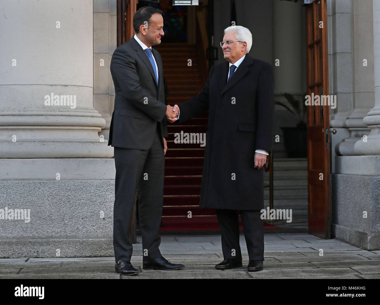 Taoiseach Leo Varadkar (left)greets Italian president Sergio Mattarella at Government Buildings in Dublin during his state visit to Ireland. Stock Photo