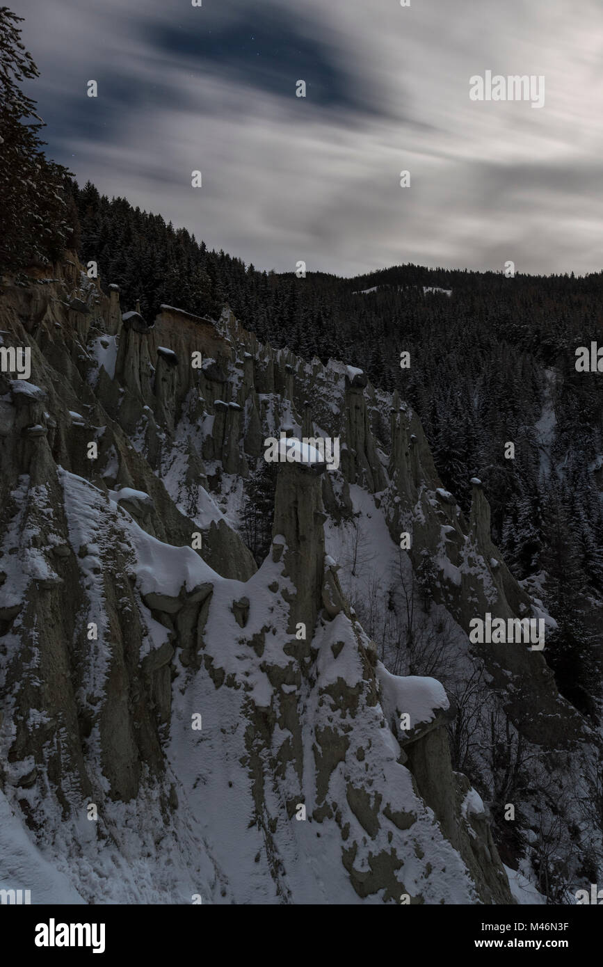 Perca/Percha, province of Bolzano, South Tyrol, Italy, Europe. Full moon night at the Earth Pyramids Stock Photo