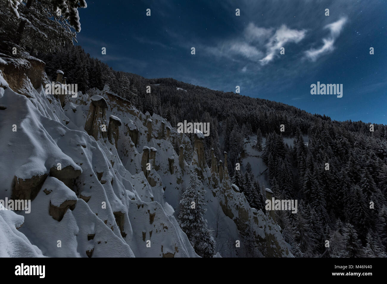Perca/Percha, province of Bolzano, South Tyrol, Italy, Europe. Full moon night at the Earth Pyramids Stock Photo