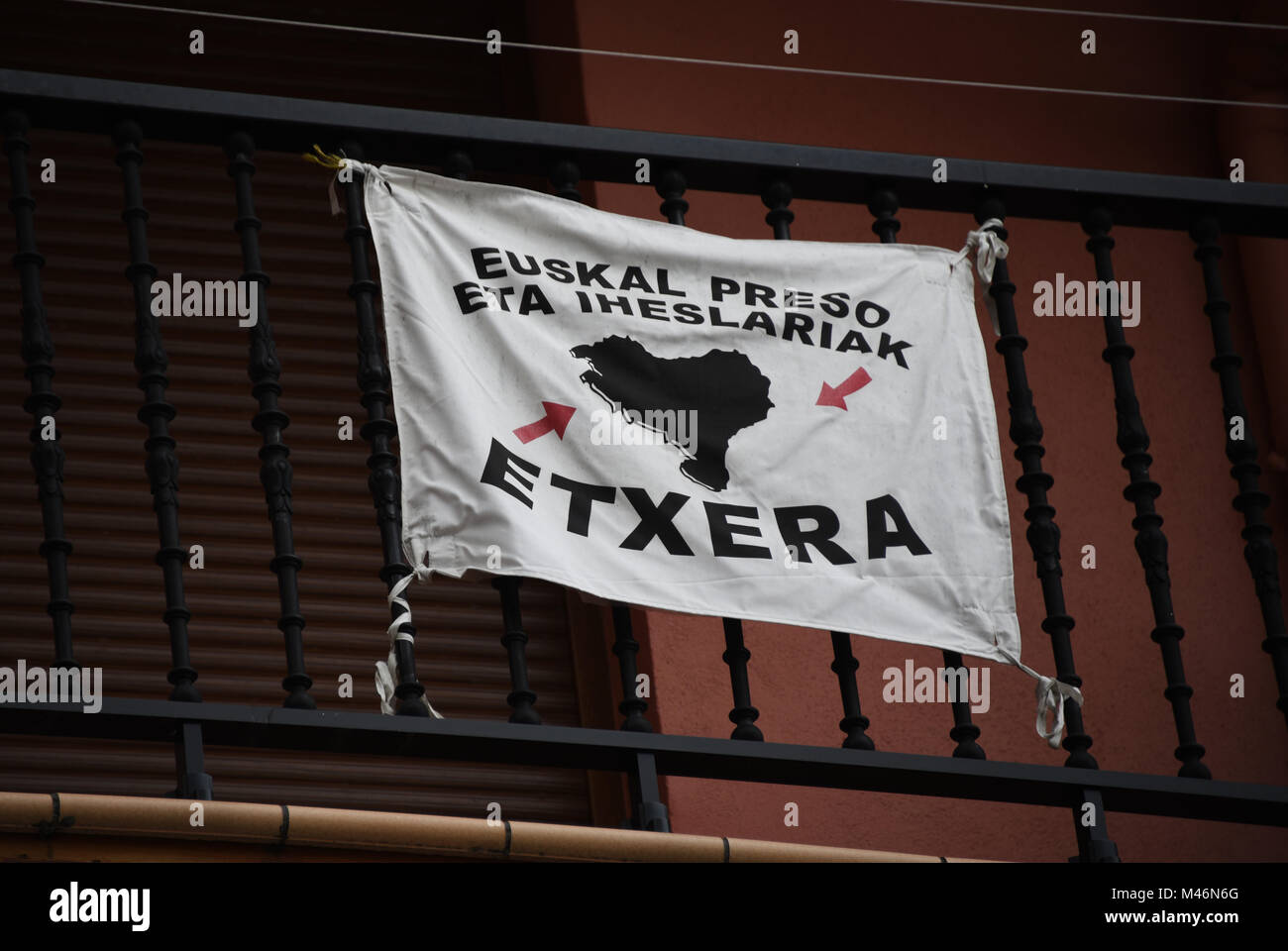 Flag of Basque movement Etxera, Mutriku harbour, Bay of Biscay, Basque ...