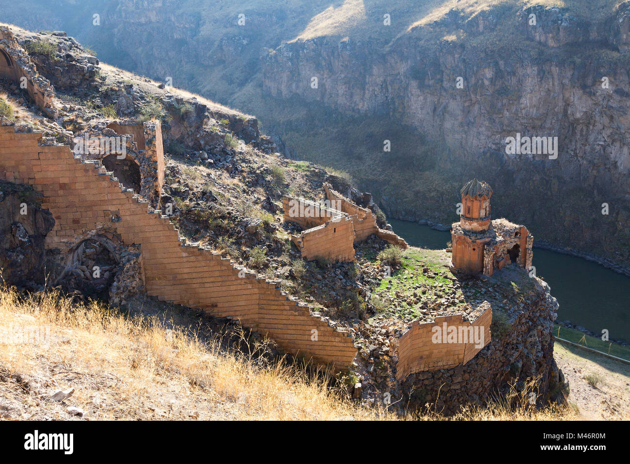 Monastery of the Virgins in the ruins of Ani, ancient capital of Armenian Bagradit Kingdom, with the River Arpacay or Akurian, on the background, maki Stock Photo