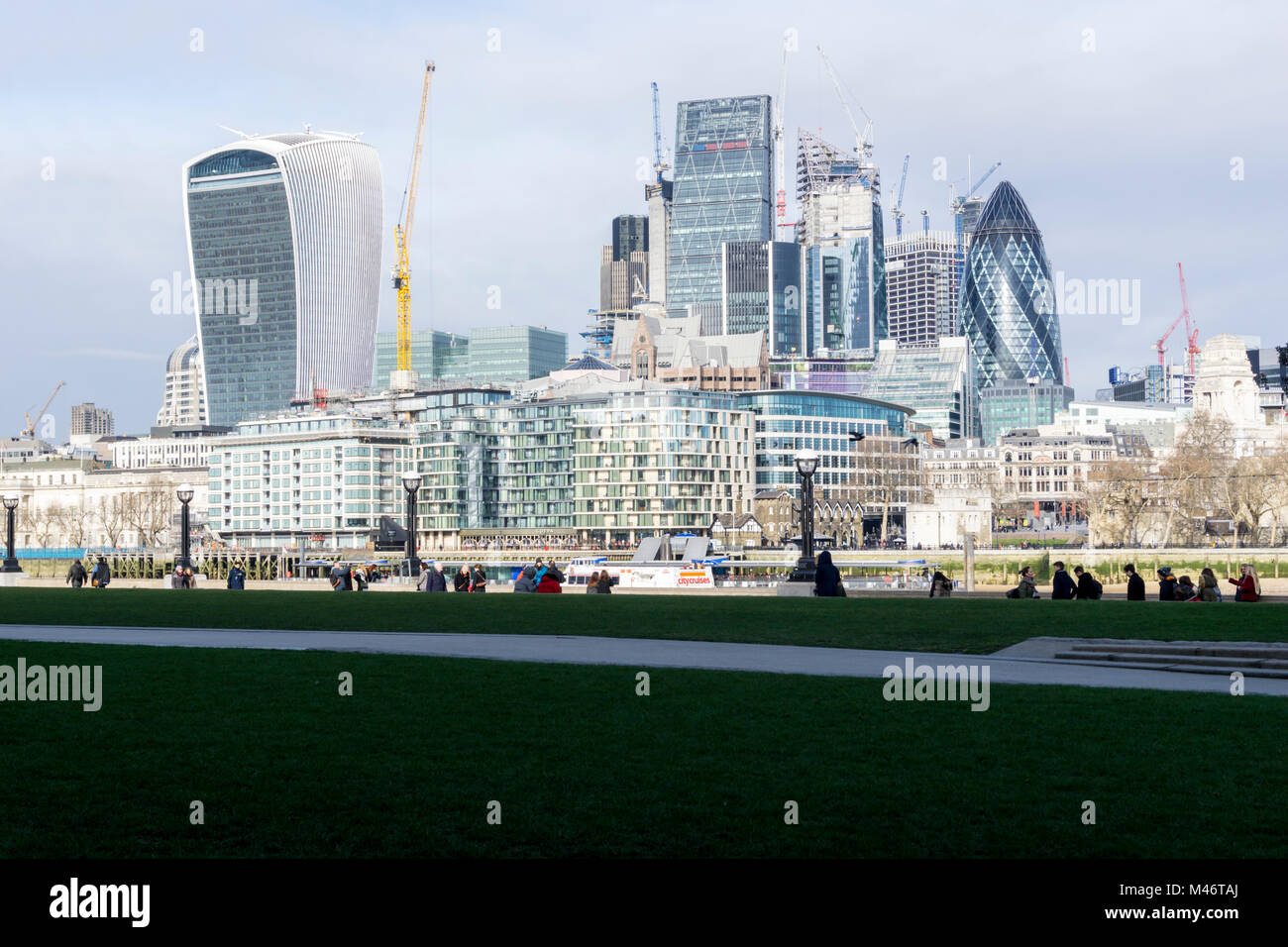City of London seen from Potter's Fields on the south bank of the Thames. Stock Photo