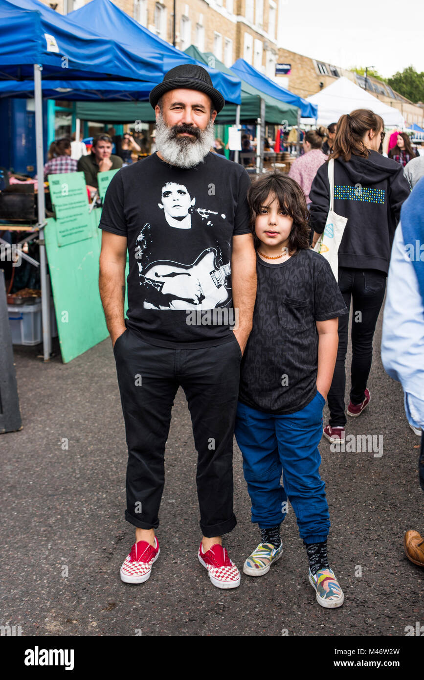 Hackney, East London, UK - August 4, 2017: Father and son enjoying  Broadway Market. Stock Photo