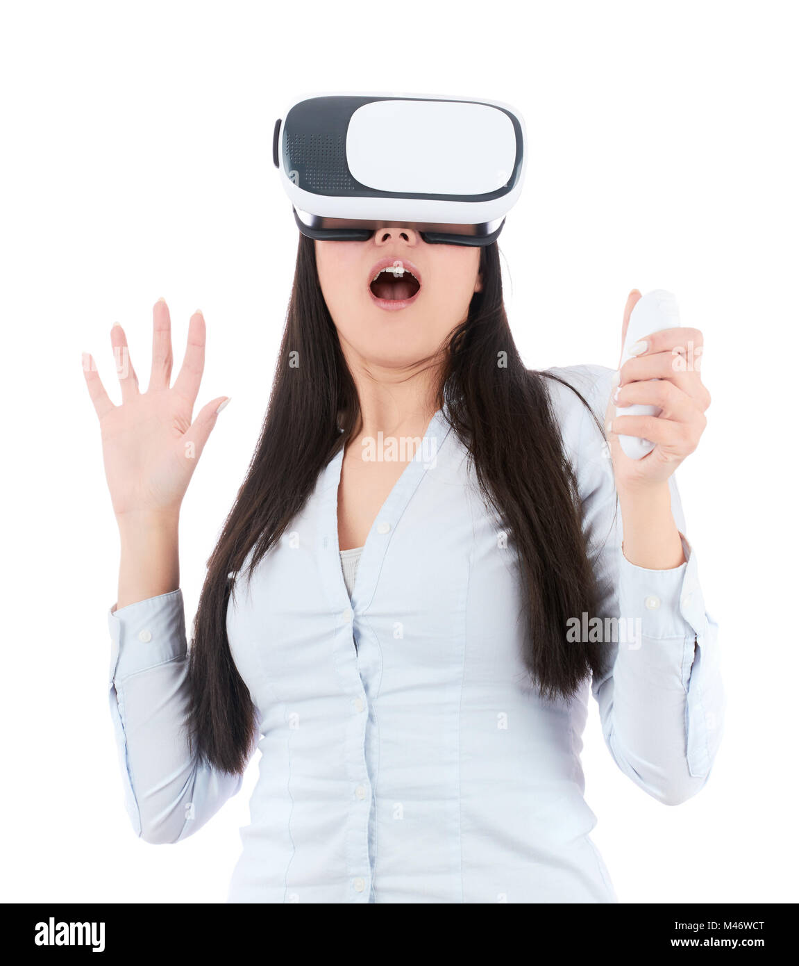 Young woman is using VR headset isolated on white background Stock ...