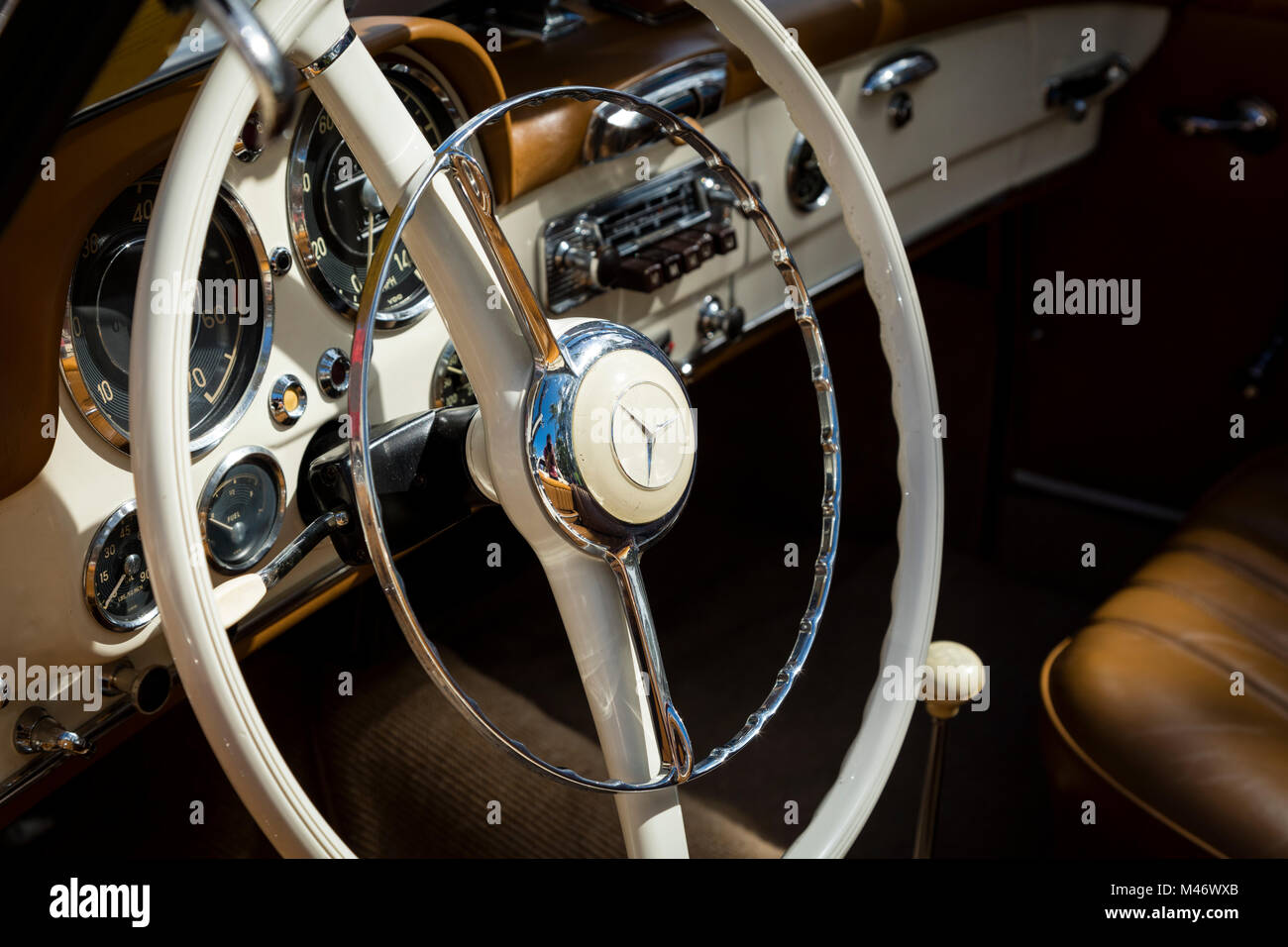 Steering wheel and dash of 1959 Mercedes Benz 190SL Convertible on display at 'Cars on 5th' autoshow, Naples, Florida, USA Stock Photo